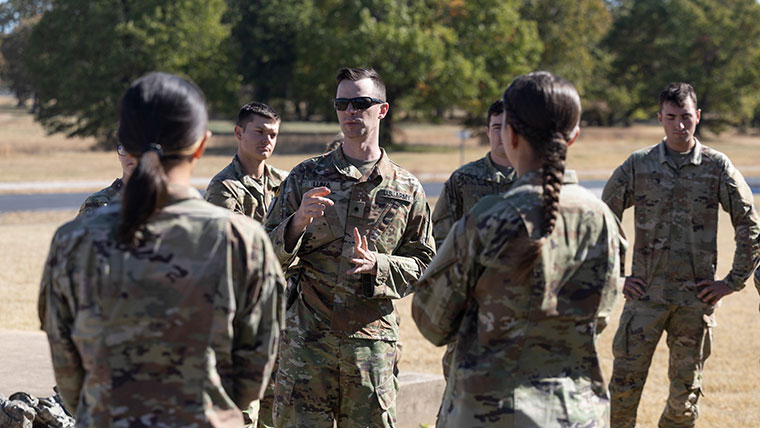 An officer speaking to the Bear Battalion during a trip to Camp Crowder.