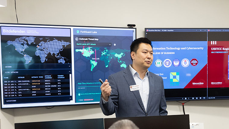 A presenter provides information on cybersecurity tools.