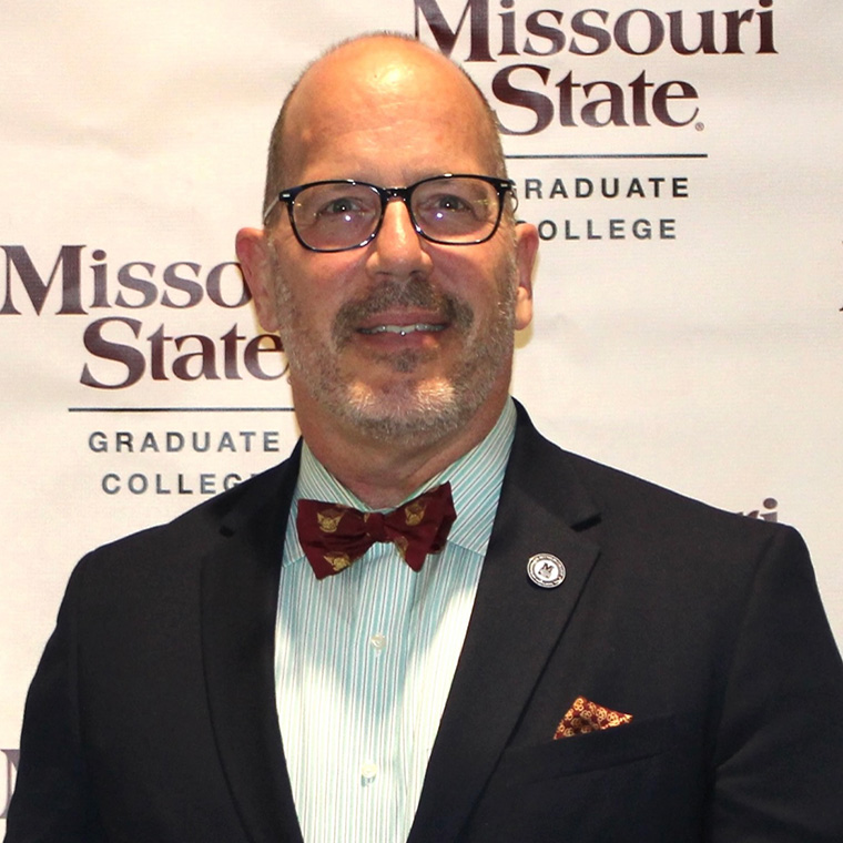 Dr. Christopher Ford at award ceremony